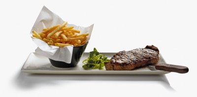  Steak and chips on white background 