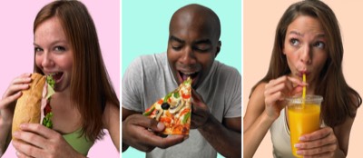  people eating a sndwich, pizza and drinking juice from a cup 