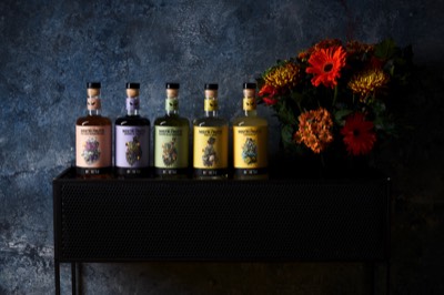  Bottles of liqueur with flowers 